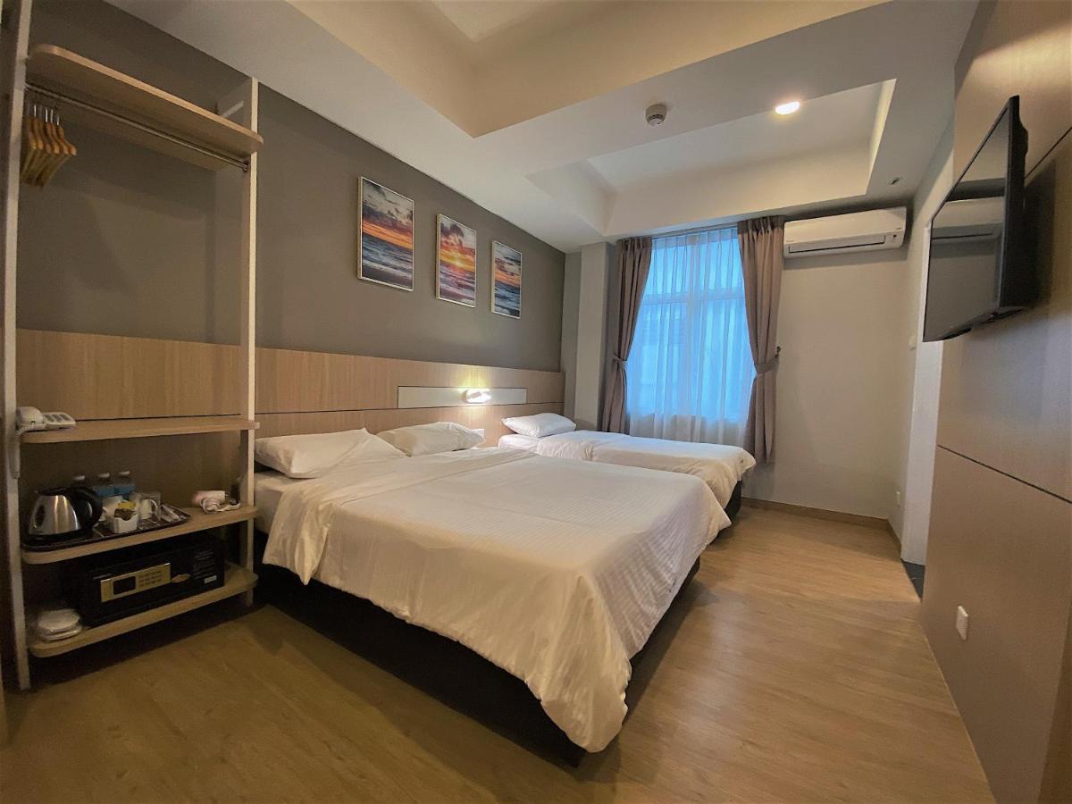 Walk In Hotel Kota Kinabalu Bagian luar foto