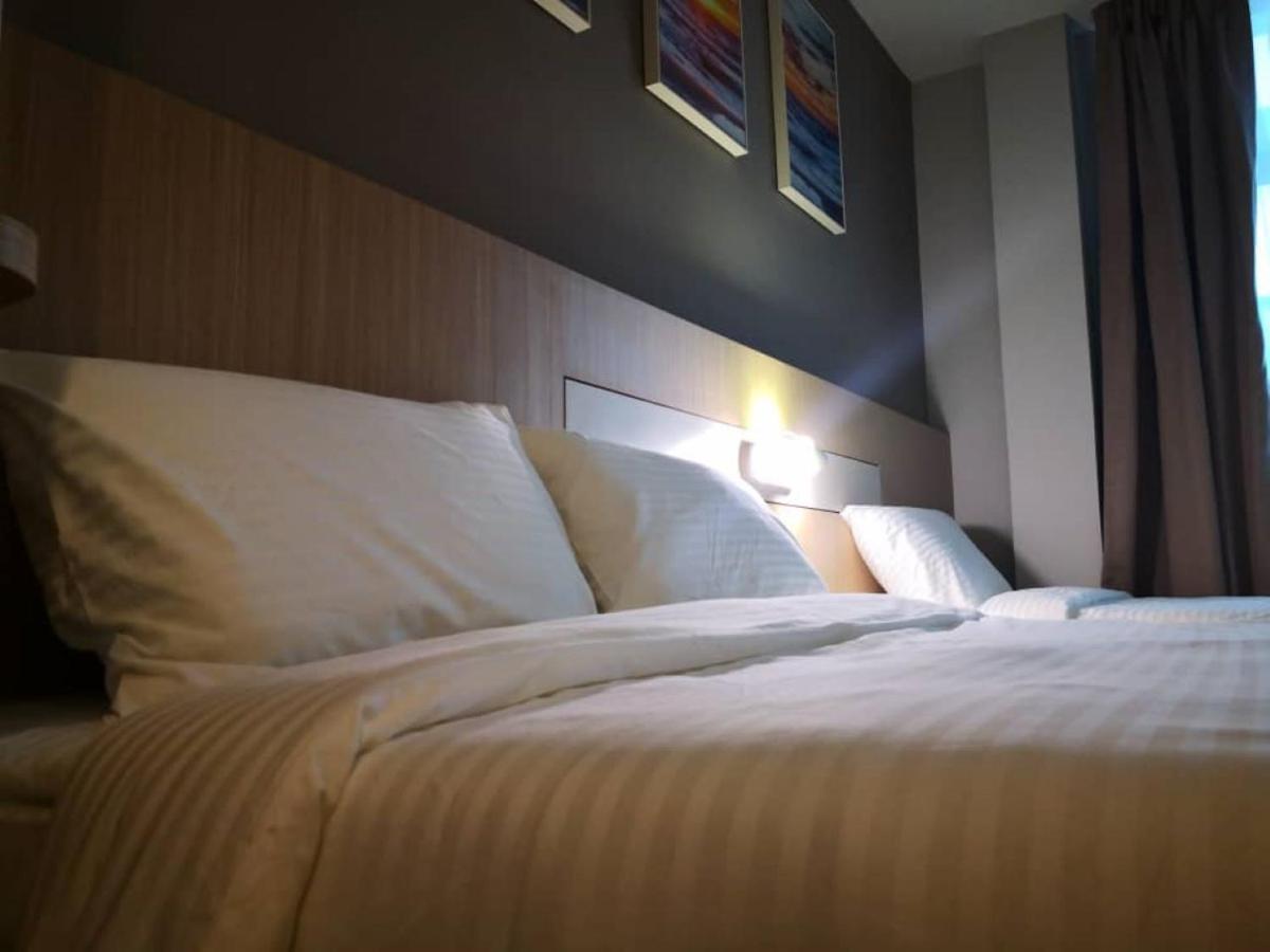 Walk In Hotel Kota Kinabalu Bagian luar foto